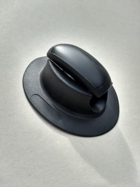 A holder for attaching a paddle to a inflatable boat A holder for attaching a paddle to a inflatable boat